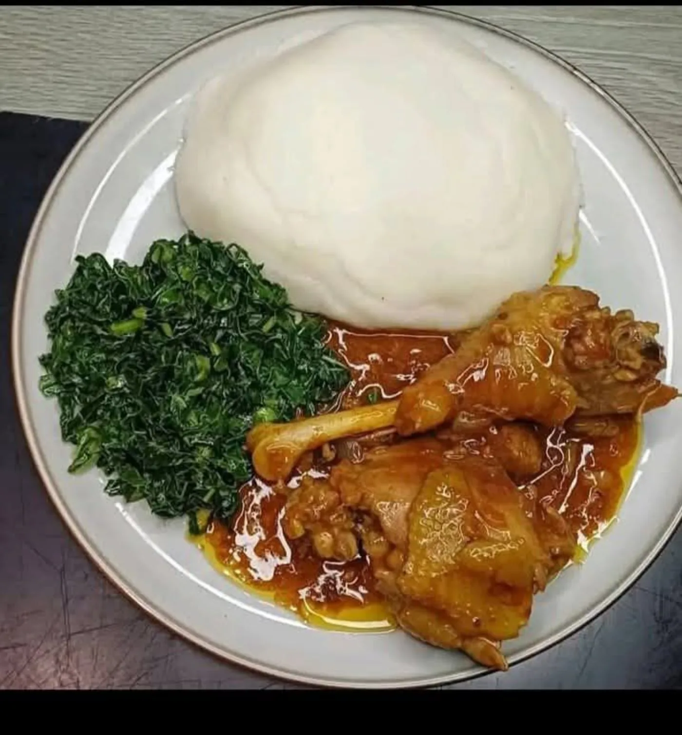 Ugali, chicken and sukuma wiki